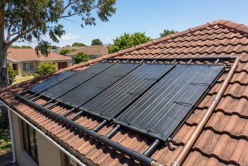 Solar pool heating panels on roof