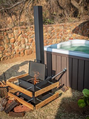 Wood fired hot tub with stove