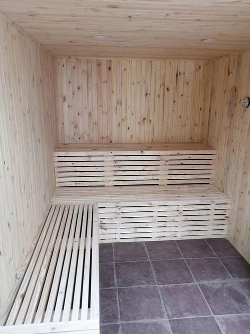 Custom sauna interior with wooden benches